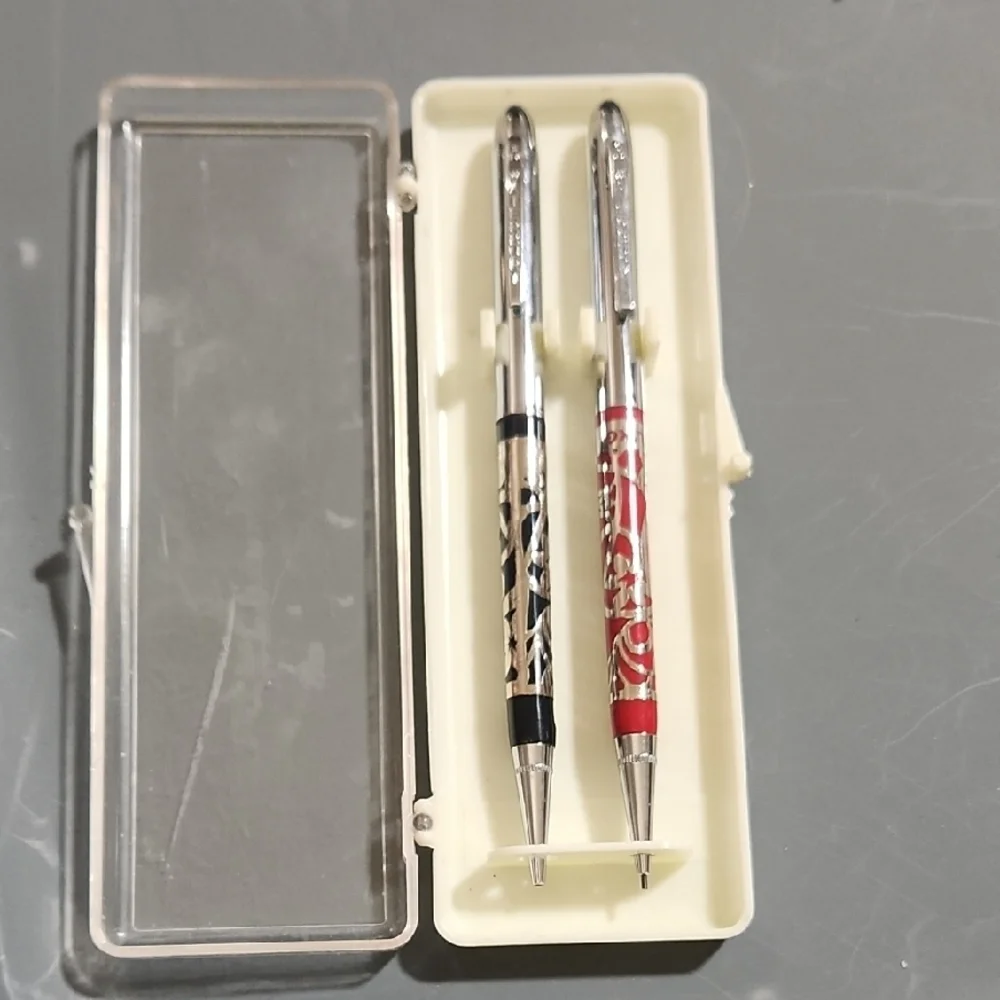 Elegant Silver and Patterned Pens Set